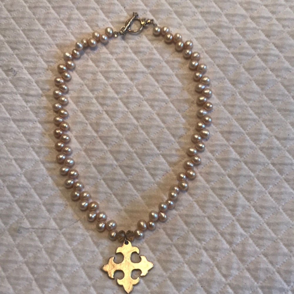 Pearl necklace with gold charm
